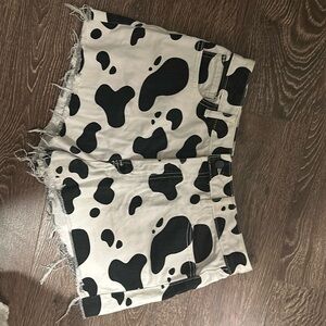Cow print denim shorts
